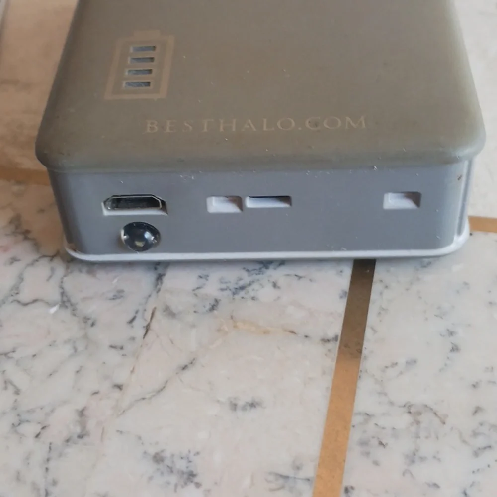 Cell Phone Portable Power bank W/cables,a flashlight & booklet